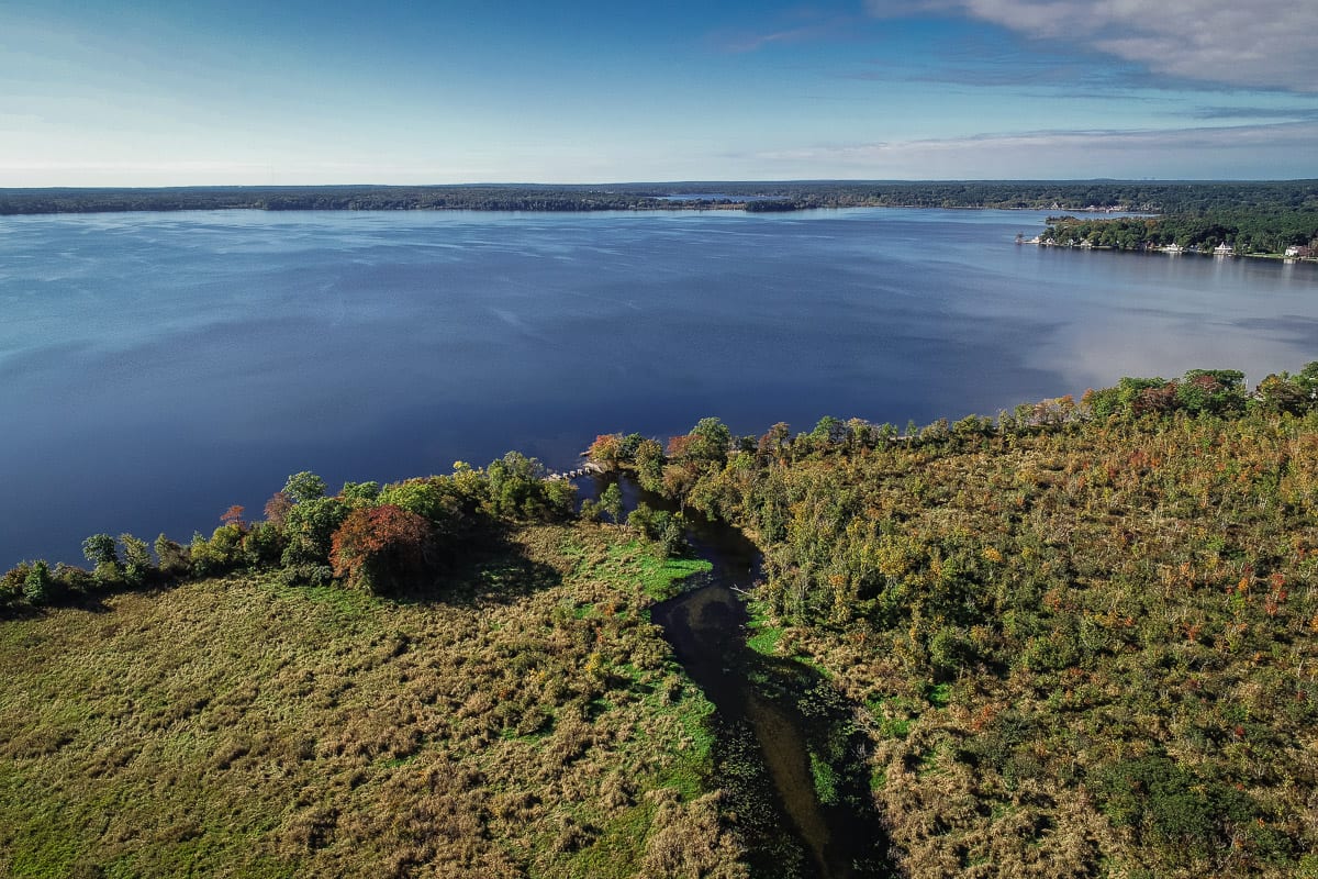 An aerial image of Assawompset Pond at its headwaters of the Nemasket River shows a significant envrionmental feature in the SPREDD region.
